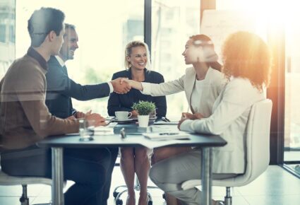 Business people shaking hands during a meeting