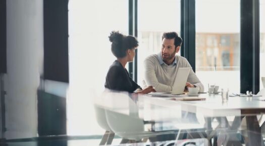 Two people in a meeting