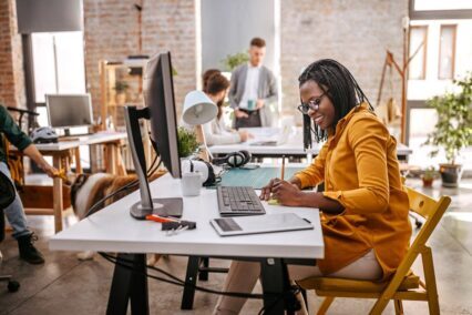 Woman working at her desk in an office