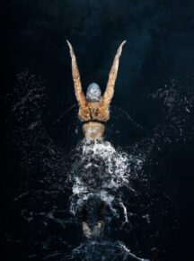 Woman Swimming From Bird Eye Perspective